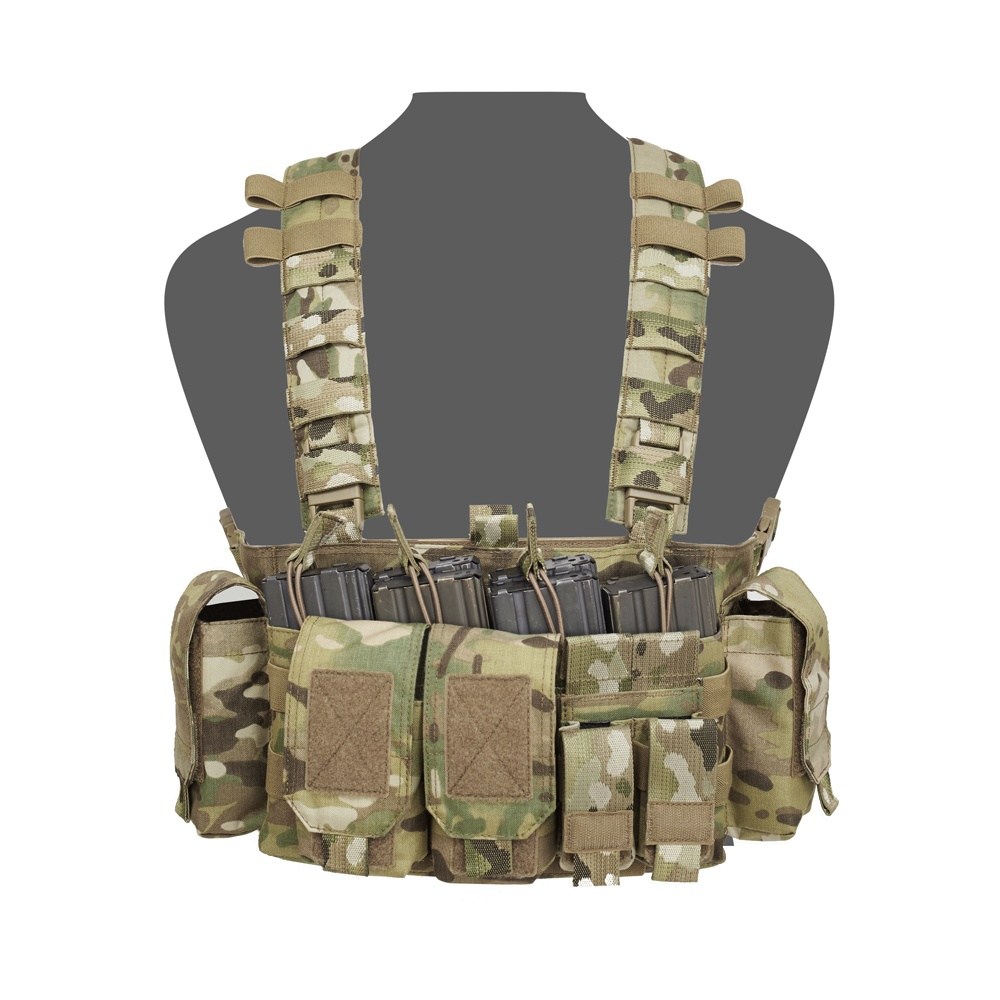 The image shows a camouflage tactical chest rig vest with multiple pouches and straps. It is equipped with several magazine holders and utility pockets. The vest is displayed on a gray mannequin torso, against a plain white background.