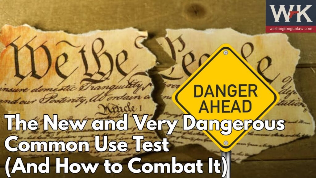 A torn U.S. Constitution document with a yellow "DANGER AHEAD" road sign overlay. The text reads: "The New and Very Dangerous Common Use Test (And How to Combat It)". The logo "WKL" and "washingtongunlaw.com" are in the top right corner.
