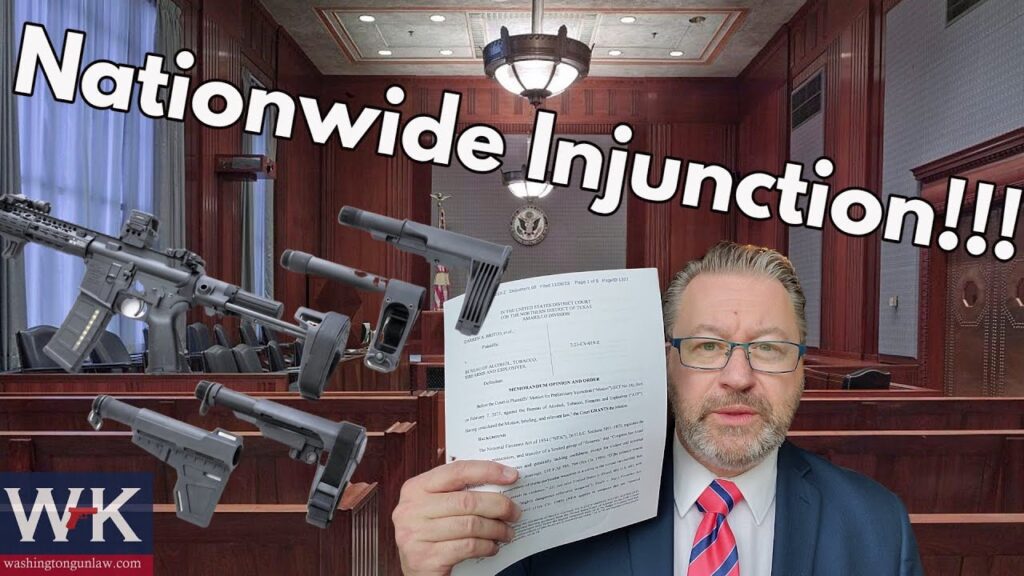 A man in a courtroom holds a document with "Nationwide Injunction!!!" written above. Several gun parts are superimposed on the left. The background shows a judge's bench and courtroom setting.