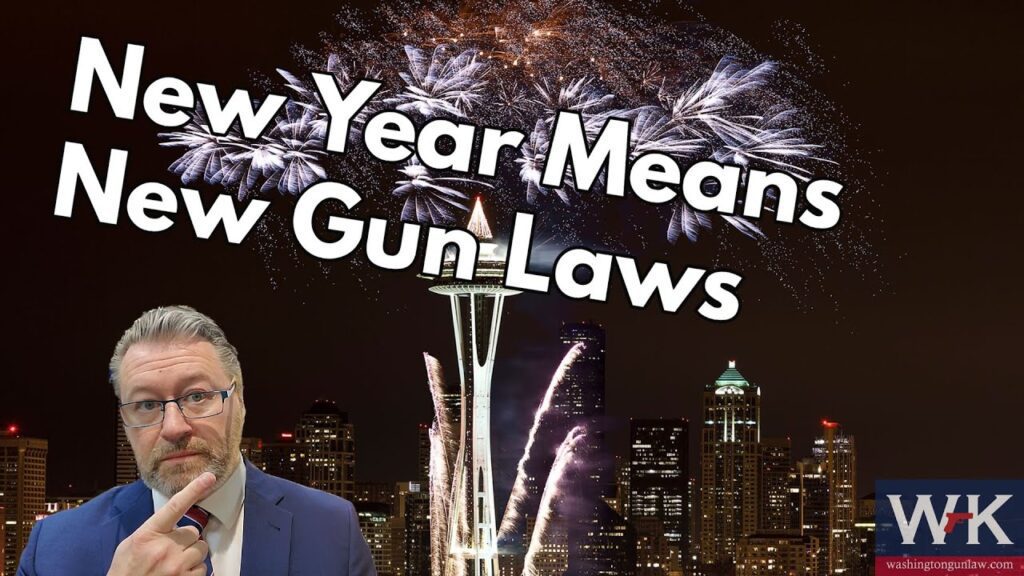 A person in a suit points upward with fireworks above a city skyline at night. Text reads, "New Year Means New Gun Laws." The Seattle Space Needle is visible. A logo in the bottom right corner says "WK.