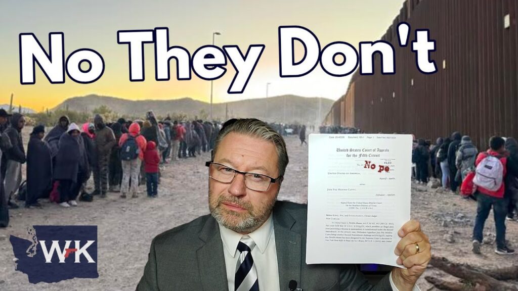 A man in a suit holds a document in front of a border wall. Crowds are visible near the wall at sunrise. The text "No They Don't" is prominently displayed at the top of the image.