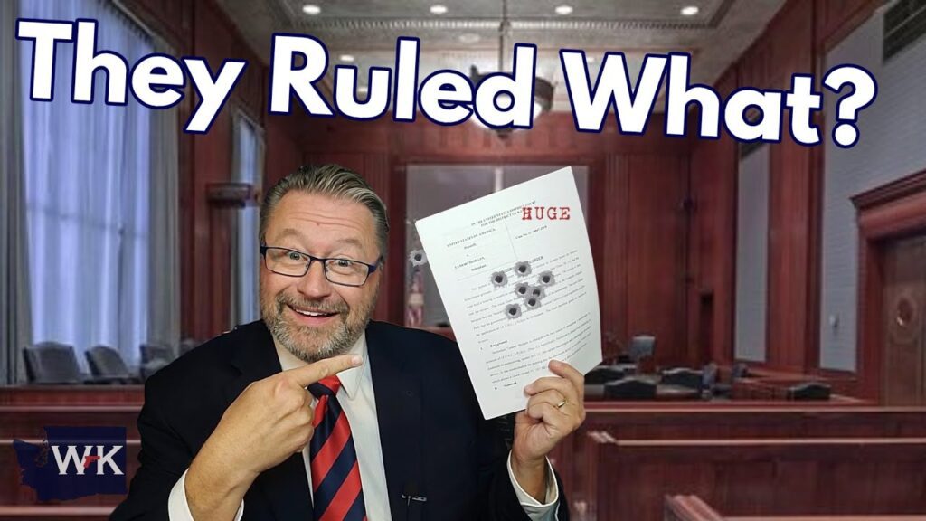 A man in a suit and glasses is in a courtroom holding a document with bullet holes labeled "HUGE." He points at it with a surprised expression. Text above says, "They Ruled What?.