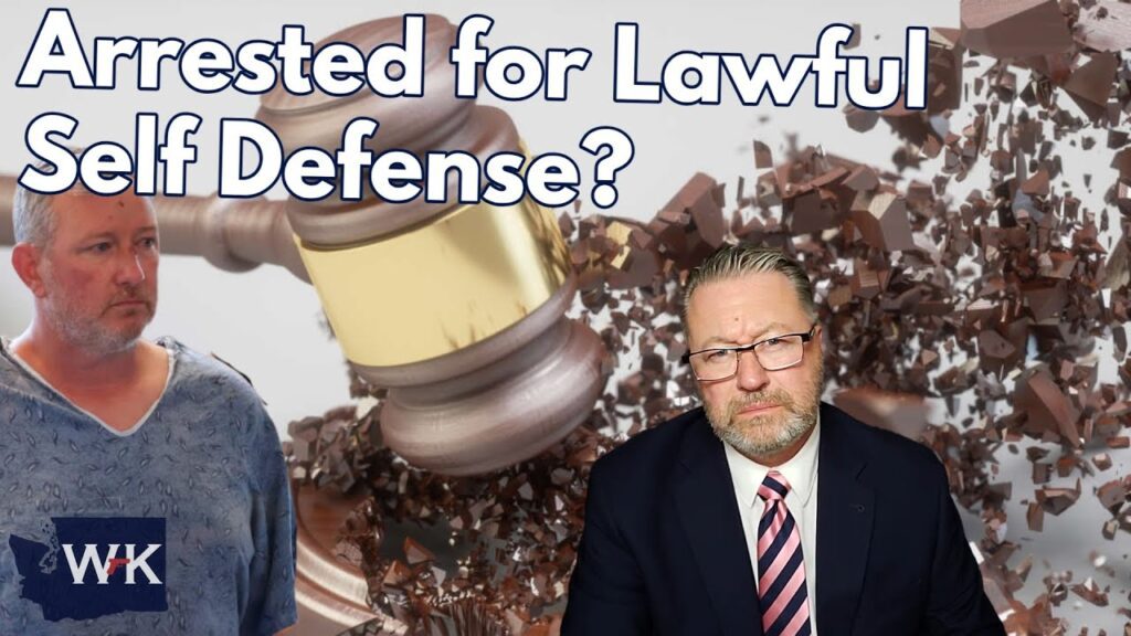 A man in a patterned suit and striped tie sits in front of a digital background featuring a large gavel and broken debris. Another man, wearing a hospital gown, is superimposed beside him. The text reads, "Arrested for Lawful Self Defense?.