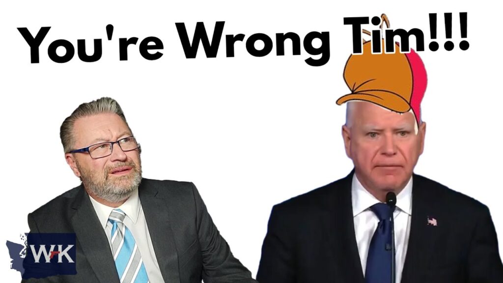A man with glasses and a suit gestures while looking at another man in a suit with a serious expression, who is wearing a cartoon hat on his head. The text above reads "You're Wrong Tim!!!.