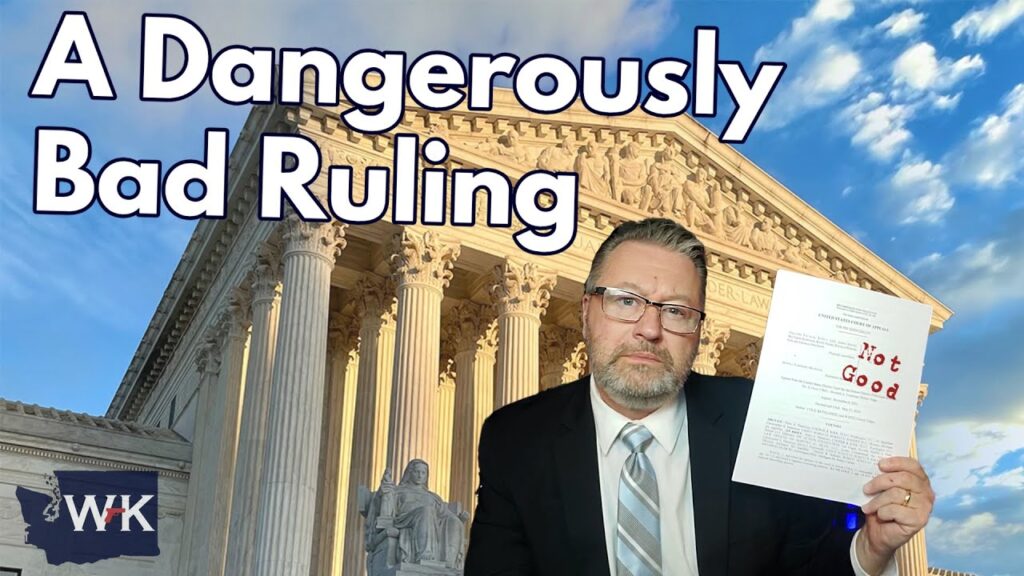 A man in a suit holding a document stands in front of a courthouse with the text "A Dangerously Bad Ruling" above. The sky is partly cloudy, and there's a logo in the bottom left corner.