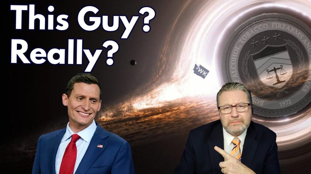 Two men are pictured. One is smiling, wearing a suit and tie, while the other, also in a suit, points at him with a skeptical expression. The background features a cosmic scene with the text "This Guy? Really?.