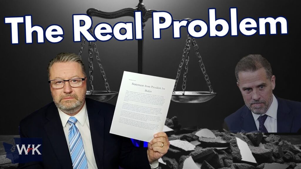 A man in a suit holds up a document against a background of scales, symbolizing justice. Another man's face appears to the right. Bold text reads "The Real Problem.