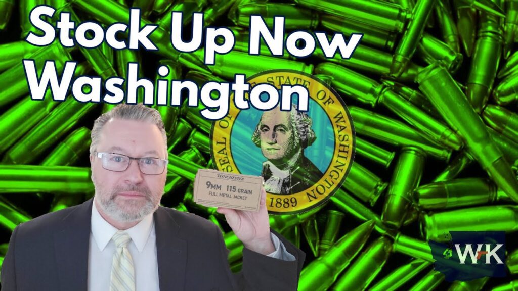 A man in a suit holds a box labeled "9mm 115 grain full metal jacket" against a background of green ammunition and the Washington state seal. Text reads "Stock Up Now Washington.