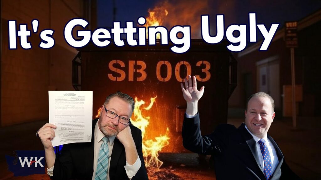 A dumpster labeled "SB 003" is on fire in an alley. A man in a suit holds documents and gestures towards the camera, looking serious. Another man in a suit waves with a smile. The text "It's Getting Ugly" is at the top.