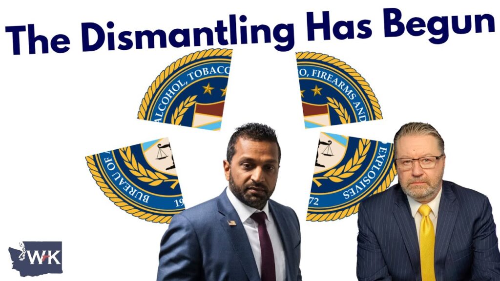 Two men in suits stand against a split seal of the ATF. Large text reads "The Dismantling Has Begun." A logo with the letters “WK” is in the lower left corner. The seal fragments highlight the agency's name.
