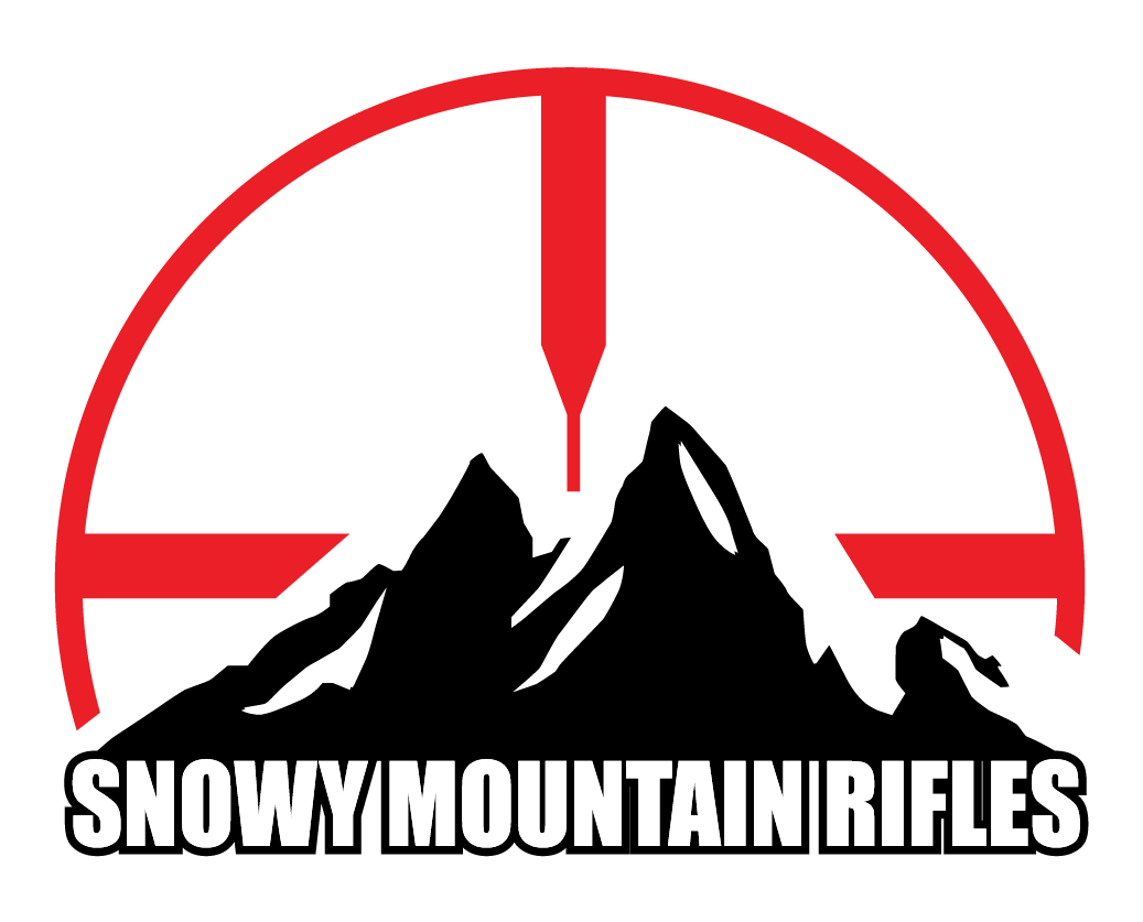 A black mountain silhouette with a bold red crosshair arching over it, and the text "SNOWY MOUNTAIN RIFLES" in large white letters below.