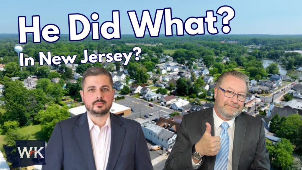 Two men in suits stand in front of an aerial view of a suburban neighborhood. Large text above reads, "He Did What? In New Jersey?" One man gives a thumbs up. The letters "WK" appear in the corner.