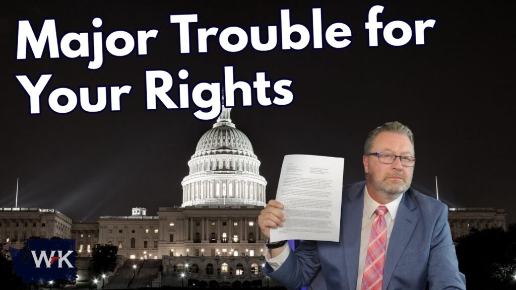 A man in a suit and pink tie holds up papers in front of the U.S. Capitol at night. Large text reads “Major Trouble for Your Rights.” The WK logo is in the bottom left corner.