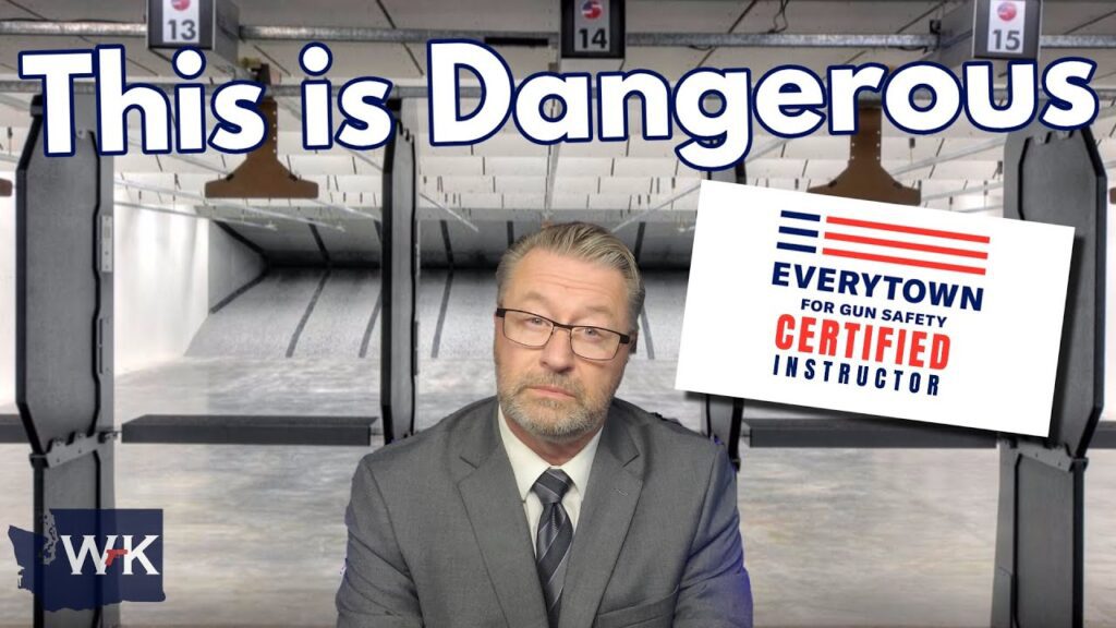 A man in a suit and glasses sits in front of an indoor shooting range backdrop. Large text above him reads "This is Dangerous." Next to him is a sign for "Everytown for Gun Safety Certified Instructor.
