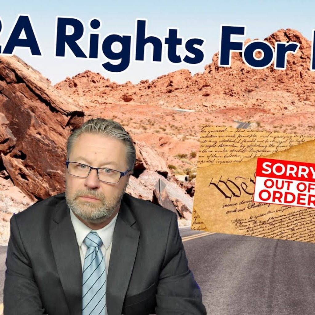 A man in a suit sits on a desert road with mountains in the background. Text says "No 2A Rights For Now." A section of the Constitution is shown with a "SORRY OUT OF ORDER" sign over it.