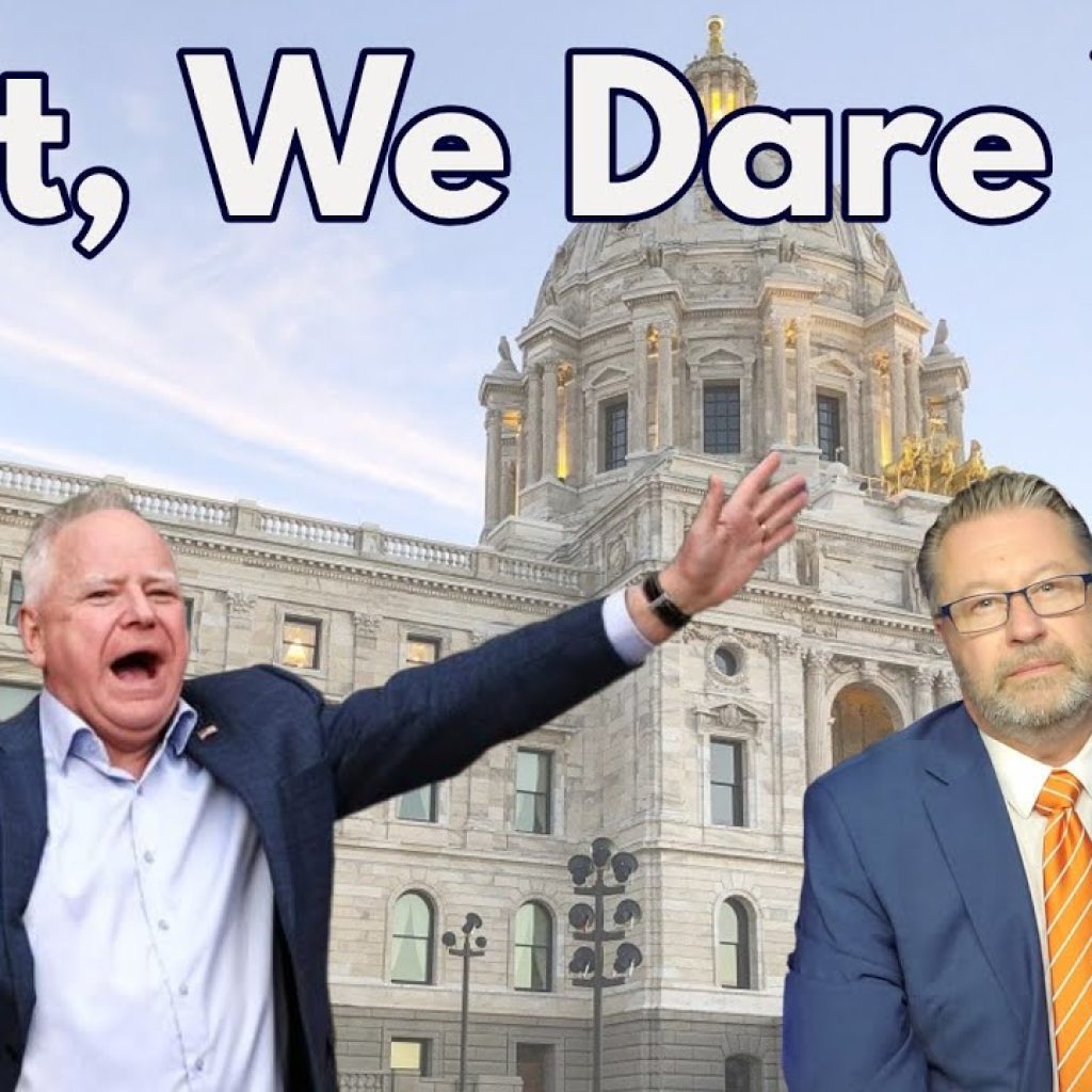 Two men in suits are in front of a large government building. One man gestures energetically while the other looks serious. The text above them reads, "Do It, We Dare You.