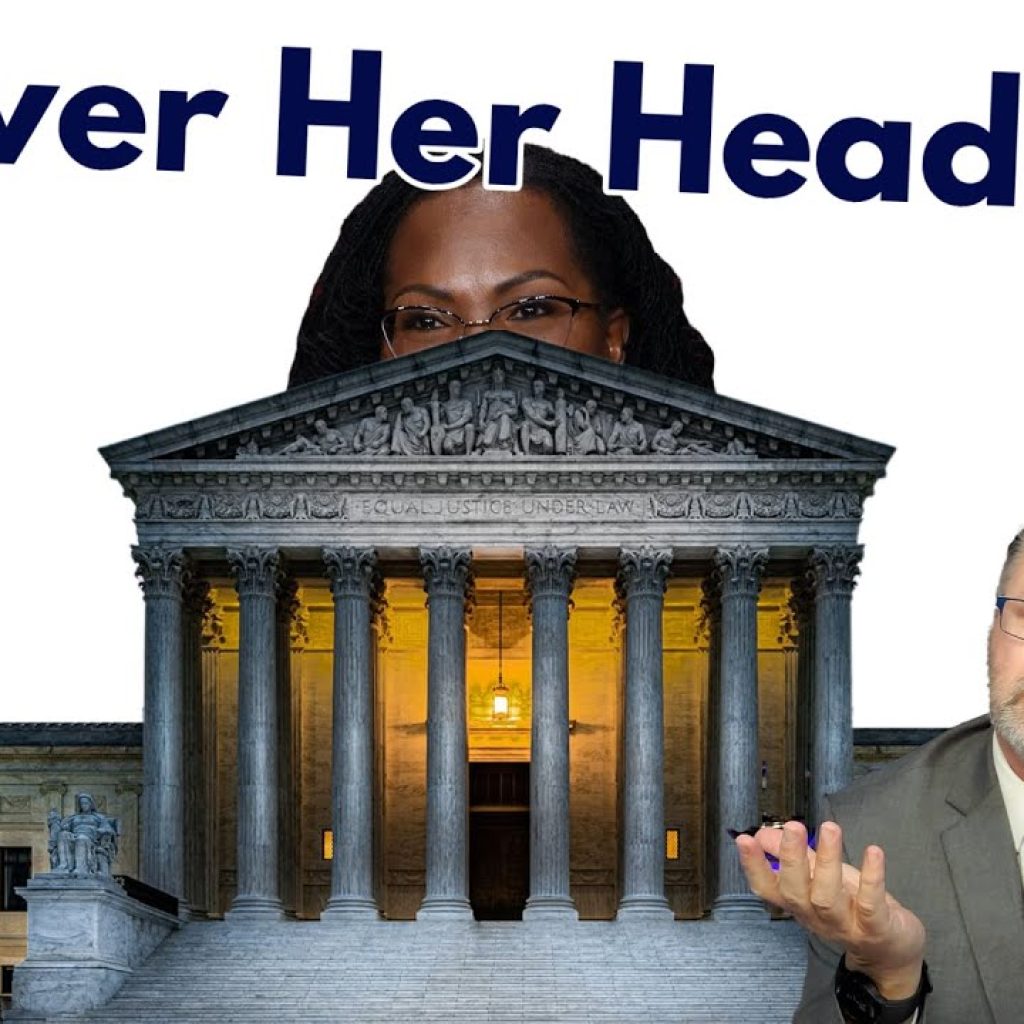 A man in a suit shrugs in front of the U.S. Supreme Court building, partially covering the face of a woman behind it. The text at the top reads, "In Over Her Head?" on a white background.