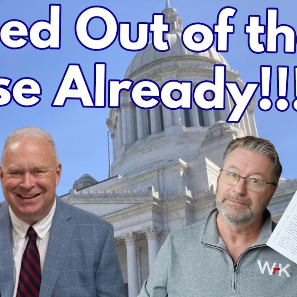 Two men are in front of a government building with a dome. Large text reads "Passed Out of the House Already!!!" One man holds a document. The WK logo and a map of Washington are in the bottom left corner.