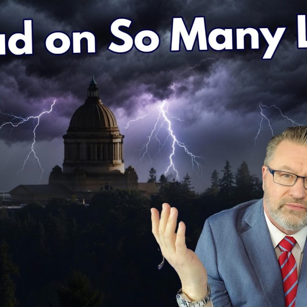 A man in a suit shrugs in front of a dark, stormy background with lightning striking behind a domed building. Large text reads: "So Bad on So Many Levels." A small "WK" logo is in the bottom left corner.